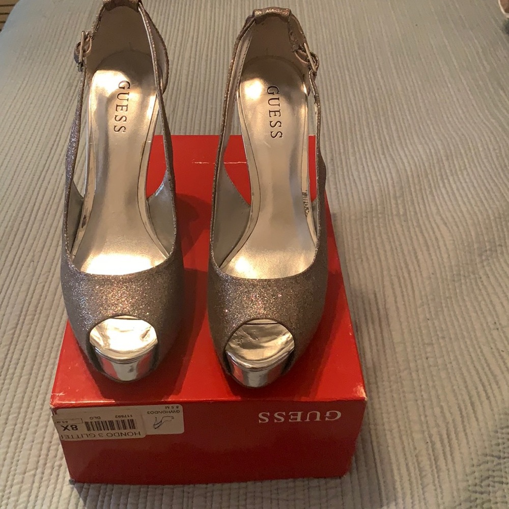 Guess women’s stiletto heel glitter shoes